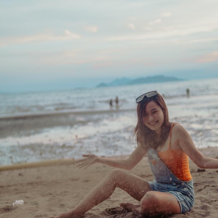 Aria Kapoor, Lead Design Curator at CrestCanvasLab, reviewing corporate floral arrangements